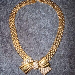 Nina Ricci Gold Bow Necklace